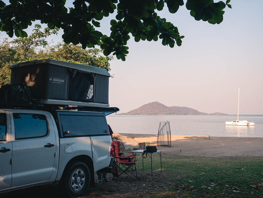 Camping next to Lake Malawi in a rooftop tent